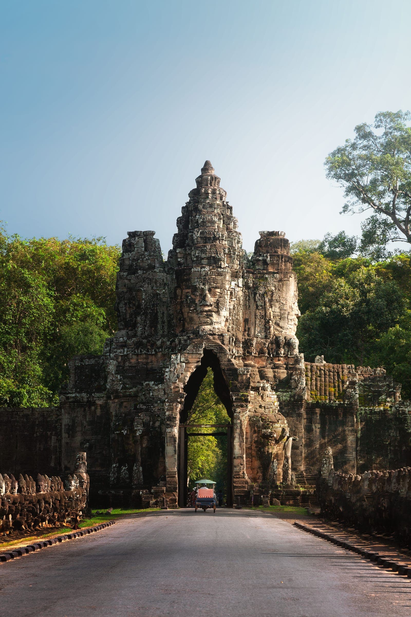 Ancient temple ruins beside a tropical floodplain near Angkor, Cambodia.
